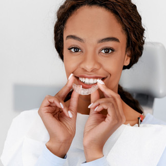 Woman using invisalign